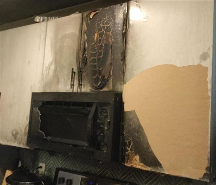 Fire damage to kitchen area.