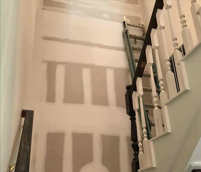 drywall installed near a stairwell