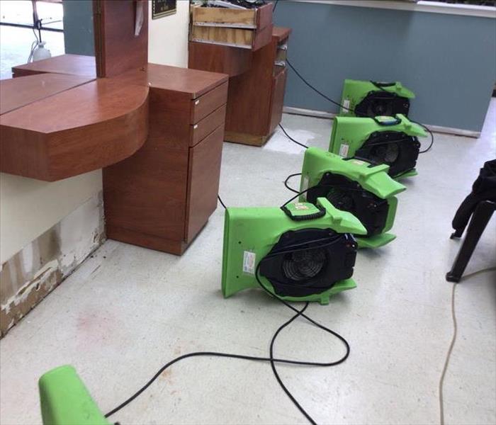 Drying equipment pointed towards wall.