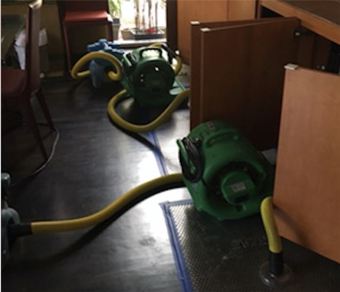 Drying equipment on floor.